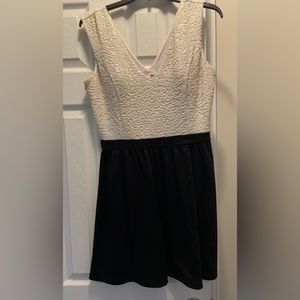 Candies polyester dress. Half black half white/gold shimmer. Size Large